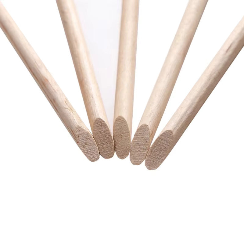 Orange wood cuticle pusher sticks for professional use